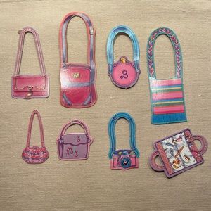 Assorted vintage Barbie paper purse accessories